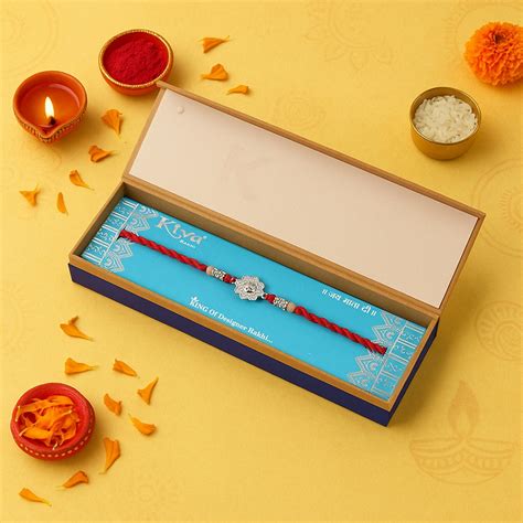 925 Silver Rakhi with Embossed Petal Floral Motif on Red Braided Threa