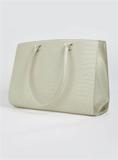 Buy Women Textured Shoulder Bag Online at just Rs. 1299.0 ...