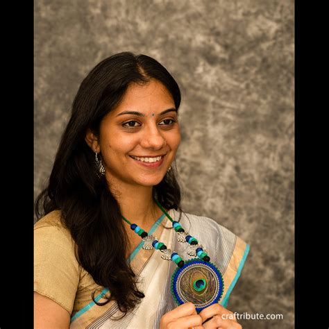 Craftribute Handcrafted Jewellery Set | Pendant with Peacock Feather