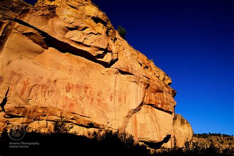 Ancient Art Archive | Ancient petroglyphs etched into a cliff face in ...