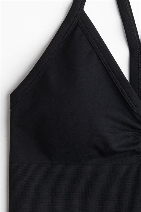 Seamless Medium Support Sports bra with DryMove™ - Black - Ladies | H&M IN