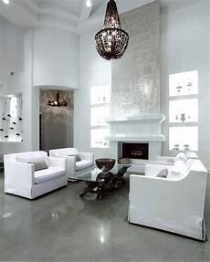 White Walls And In Floor Storage Make This Creative House Design white walls contrast with polished grey concrete floors by White Walls And In Floor Storage Make This Creative House Design white walls contrast with polished grey concrete floors by