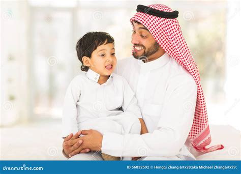 Arabic man talking son stock photo. Image of happy, head - 56832592