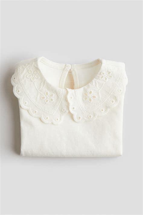 Camisola com gola em bordado inglês - Creme - CRIANÇA | H&M PT