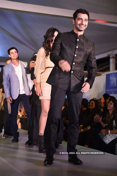 Gautam Rode, Gaurav Gera and Sudhanshu Pandey walk the ramp during ...