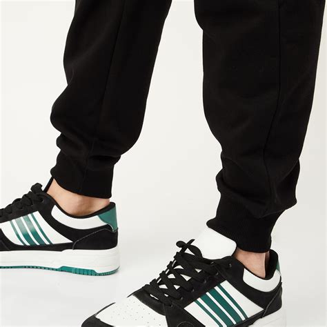 Buy Men Solid Athleisure Joggers Online at just Rs. 899.0 ...