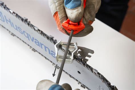 Image result for Using a Chainsaw Filing Guide