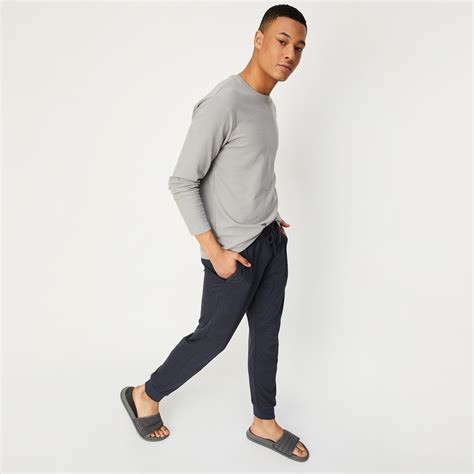 Buy Men Solid Elasticated Joggers Online at just Rs. 699.0 ...