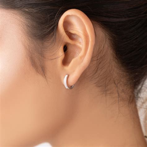 Sterlyn Poppy White Huggies Earrings – 925 Sterling Silver