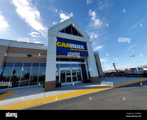 Facade of Carmax used car sales company store in Pleasanton, California, wide angle, January 31 ...