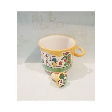 Bottle holder with ceramic cap