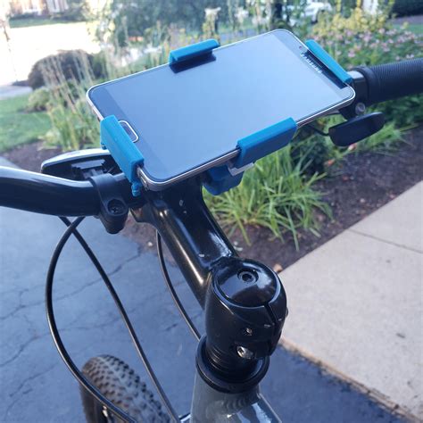 I designed this 3d printed phone mount for my bike. Inspired by Quad Lock, it's easily removable ...