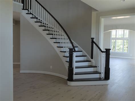Oak Hardwood Floor With Dark Light Contrast Staircase
