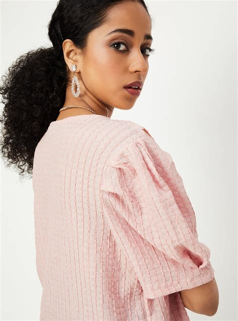Buy Women Textured Peter Pan Collar Top Online at just Rs. 999.0 ...