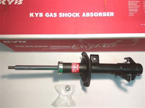 Передний правый амортизатор Nissan Tiida KYB 333390, газомасляный