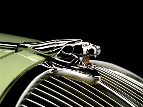 World Of Cars: Jaguar logo wallpaper