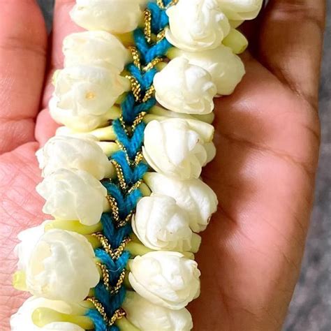 Image result for Small Flower Using Thread and Hand
