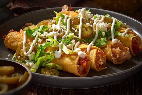 Deep-Fried Chicken Flautas with Refried Beans and Green Salsa*