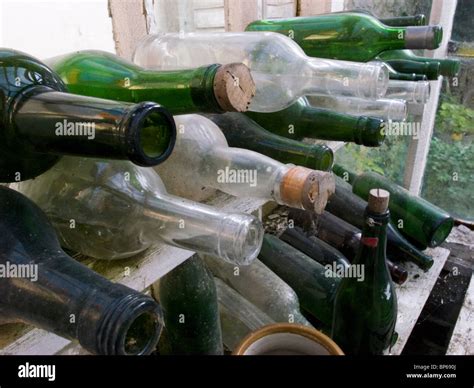 Old, dusty, empty wine bottles Stock Photo - Alamy