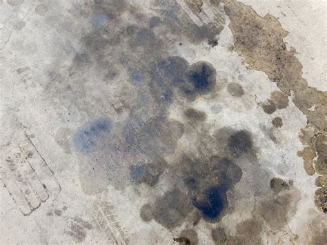 How to Remove Oil Stains From A Garage Floor | Affordable Garage Door Fix