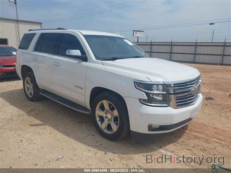 Report 1GNSCCKC4HR170658 CHEVROLET TAHOE 2017 White Gasoline - price and damage history