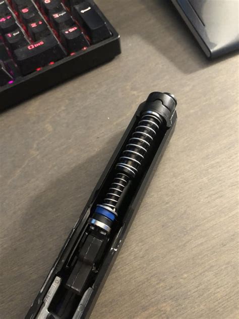 Image result for How to Get Spring Off Factory Glock Guide Rod