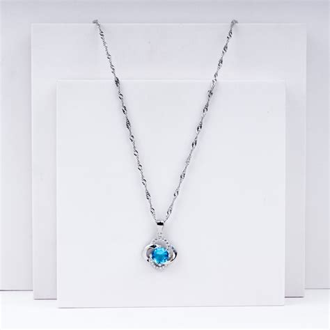 Blue Topaz Halo Pendant Necklace in 925 Sterling Silver | Vanika jewellery