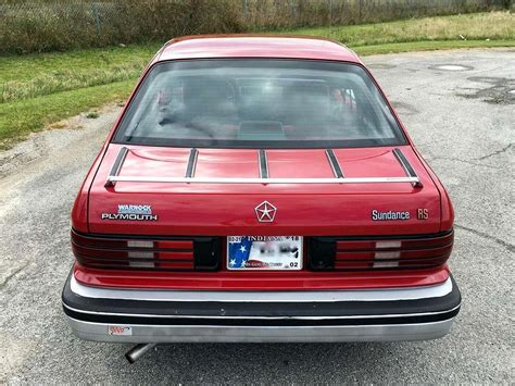 1989 - PLYMOUTH SUNDANCE RS TURBO | Fabricante PLYMOUTH | PlanetCarsZ