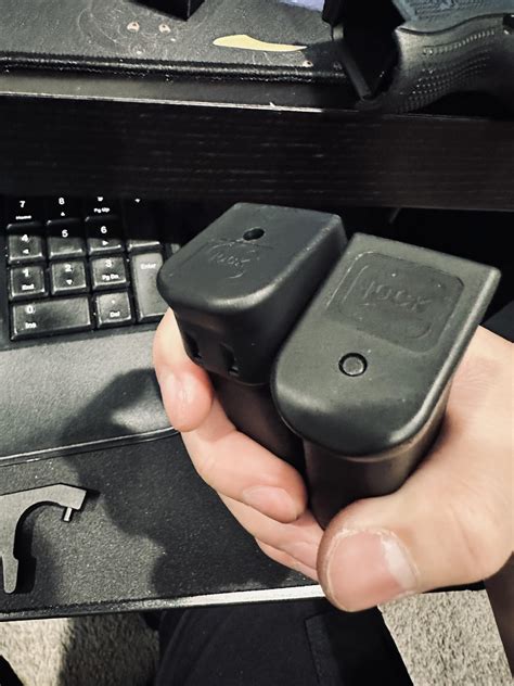 Is there a trick to take apart a mag that has the oem +2 extension ...