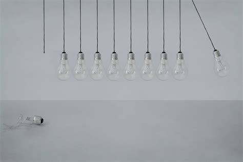 Download Swinging Transparent Light Bulbs Wallpaper | Wallpapers.com