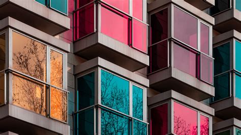 Download wallpaper 2048x1152 building, facade, glass, colorful ...