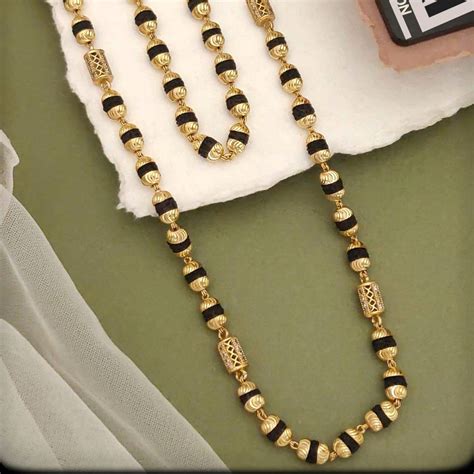 Exclusive Black & Golden Rudraksha Mala – Shop Now | Zuveri