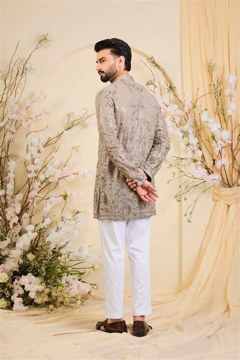 Mouse-toned short kurta with a sequined base, detailed floral ...