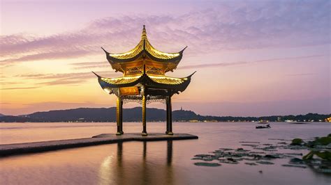 Hangzhou West Lake with Jixian Pavilion at sunset, China | Windows ...