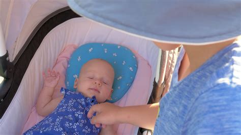 Boy looking after baby sister outdoor 28774386 Stock Video at Vecteezy