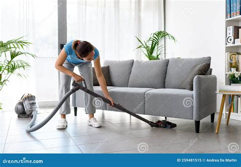 Woman Vacuuming the Floor at Home Stock Image - Image of domestic ...