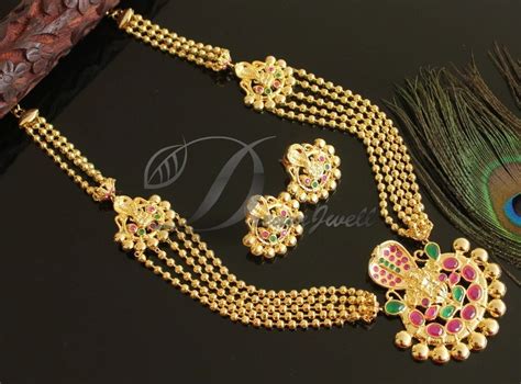 DREAMJWELL - Beautiful Gold Tone Ruby-green Lakshmi Designer Short Haa ...