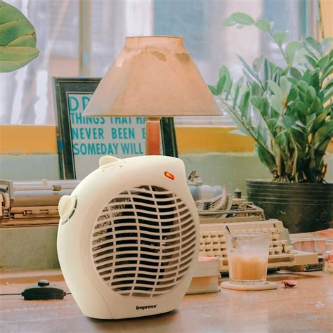 Impress 9-in 120-Volt 2-Speed Indoor White Desk Fan 84978954M at Lowes.com