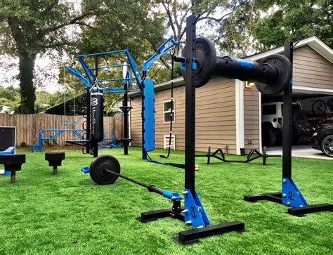 Backyard training with Indy Squat stands and the MoveStrong T-Rex outdoor functional training ...