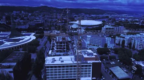 Aerial view of a construction site featuring cranes and buildings, representing urban development relevant to managed IT services for businesses in Pennsylvania.
