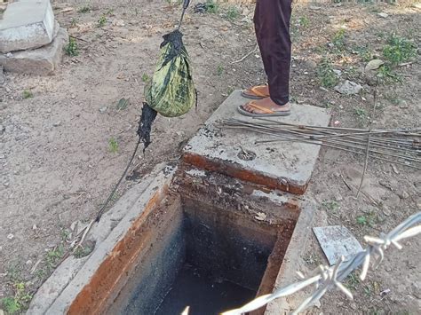 Cleaning of choked underground sewer line in telephone exchange area of ...