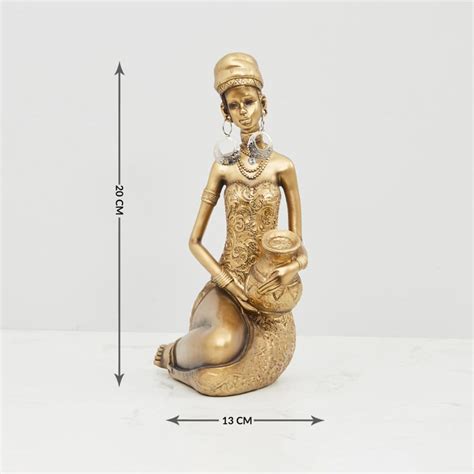 Buy Jaguar Sitting Lady Figurine from Home Centre at just INR 999.0