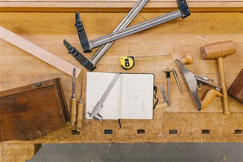 "Topshot Of A Workbench With A Design And Tools On It" by Stocksy Contributor "Ivo De Bruijn ...