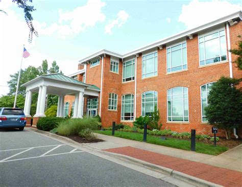 Who decides whether library parking lot can be used for apt.’s overflow ...