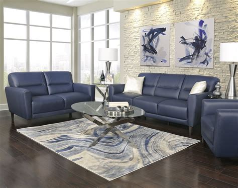 living room with blue leather sofa