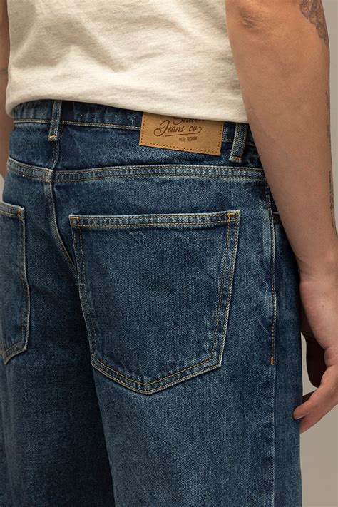 Buy Men's Refined Dark Blue Relaxed Fit Jeans Online | SNITCH