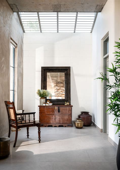 A restful vacation home in Tamil Nadu quietly submerges into its earthy ...