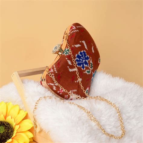 Double Ikat Patola Clutch Flowers – My Store