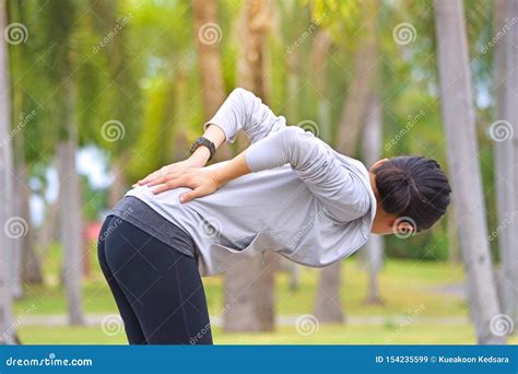 Young Woman with Lower Back Pain while Running Exercising after Jogging ...