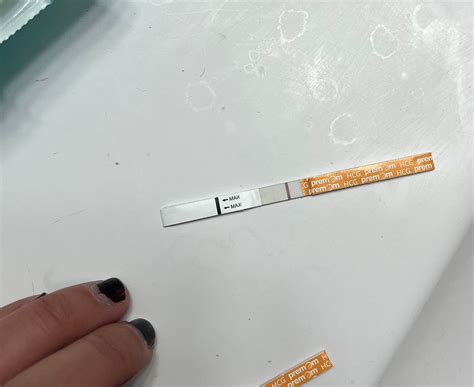 Test defect or faint positive?? | BabyCenter